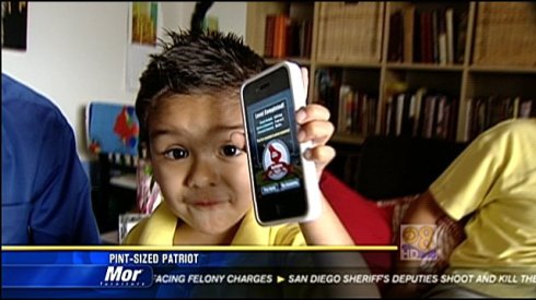 little boy with iPhone