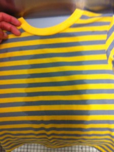 little kid's shirt gets wet