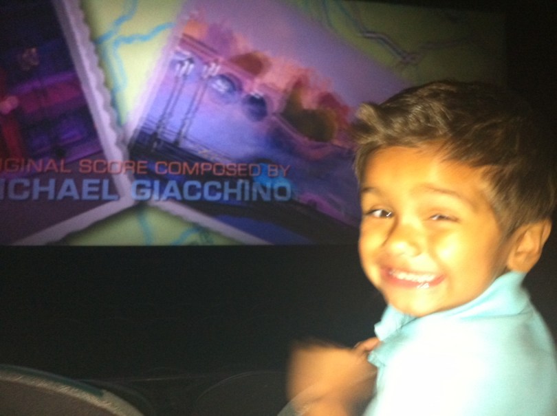 little boy in movie theater