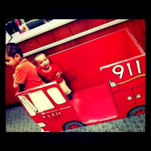 kids playing in firetruck Little boys in firetruck