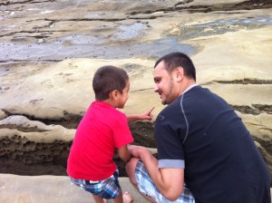 Daddy talking to son father consoles son