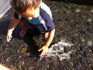 boy playing in water